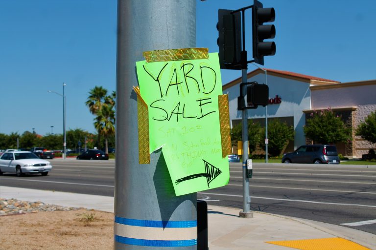 Abandoned yard sale signs drive council member crazy