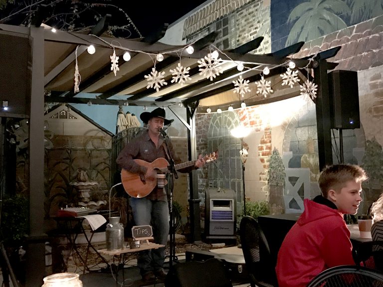 Self-taught local singer-songwriter Jason Cade performs in Old Town Clovis