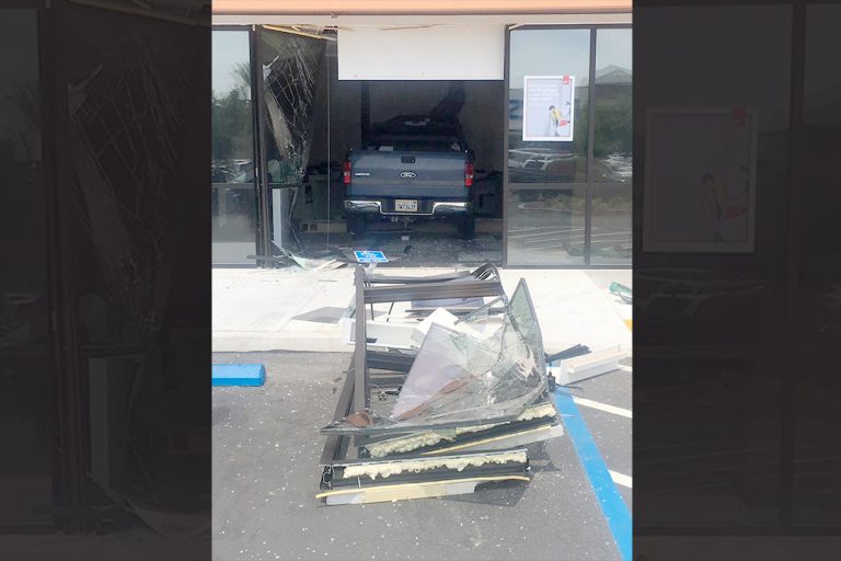 Vehicle crashes into business at the Trading Post shopping center