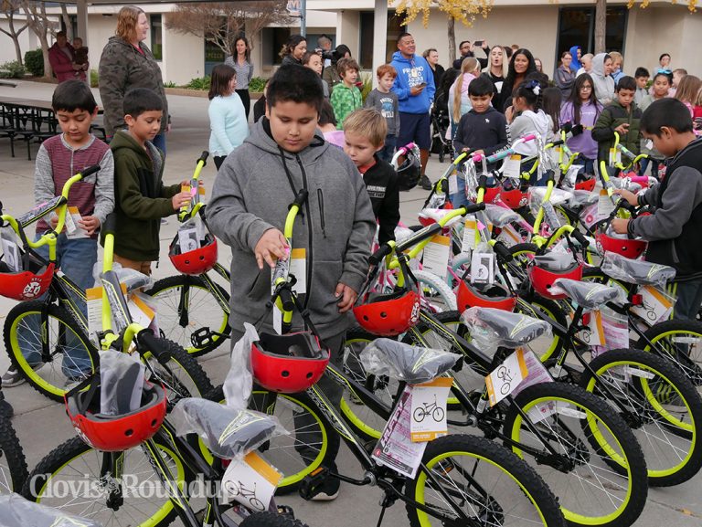 Elementary School Students Get Holiday Surprise on Wheels