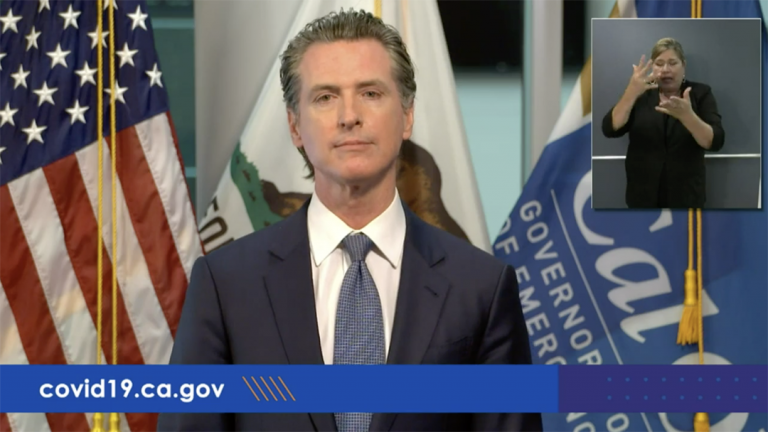 Hoping to stave off legal challenges, Newsom signs mail-in ballot bill
