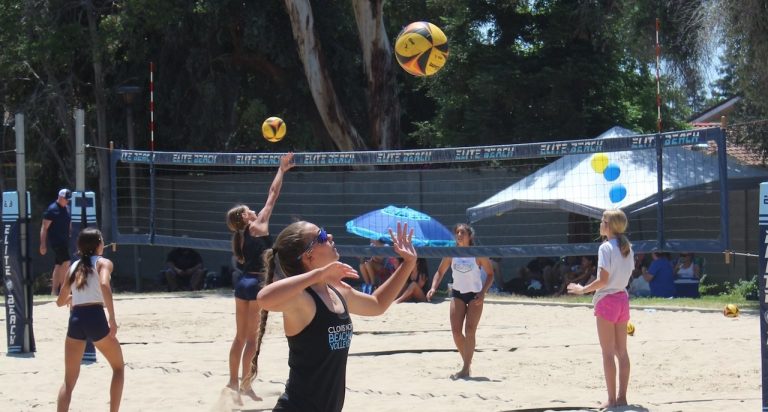 Beach Volleyball Tournament Aims at District Adoption