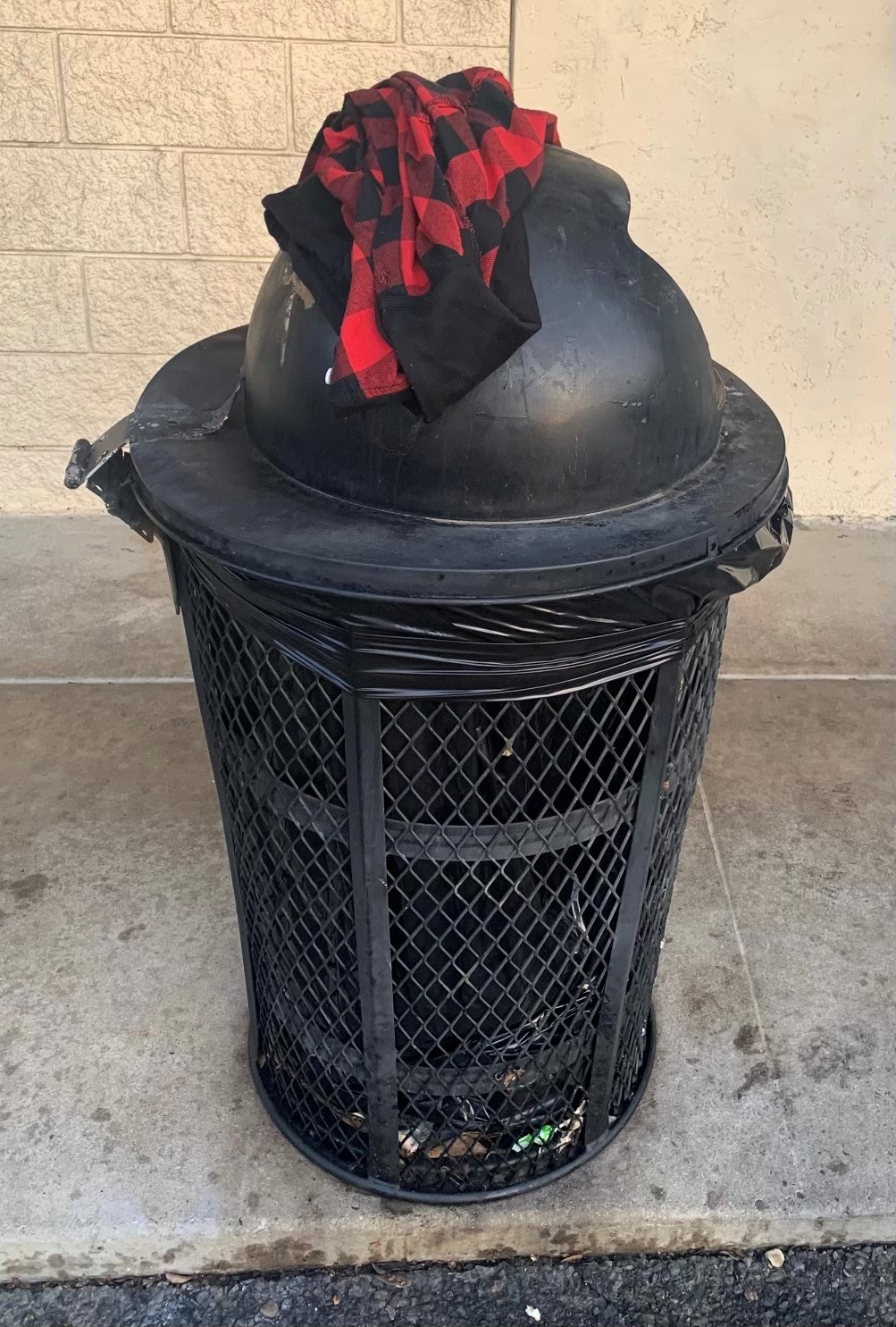 Suspect Clothing on Trash Can